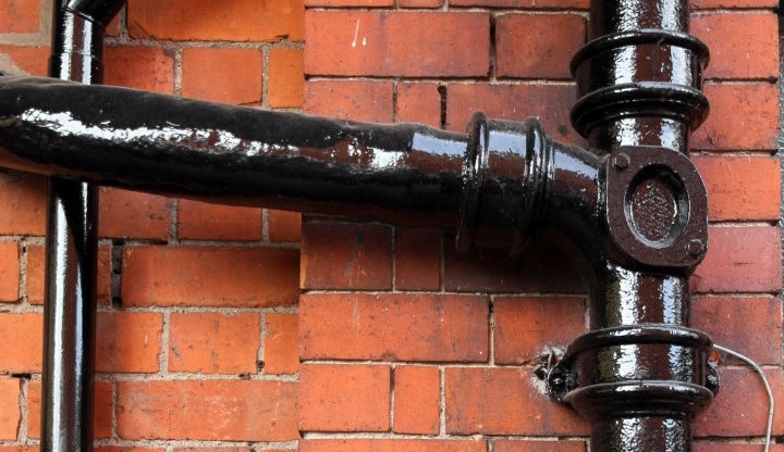 A household soil pipe running down an outside wall